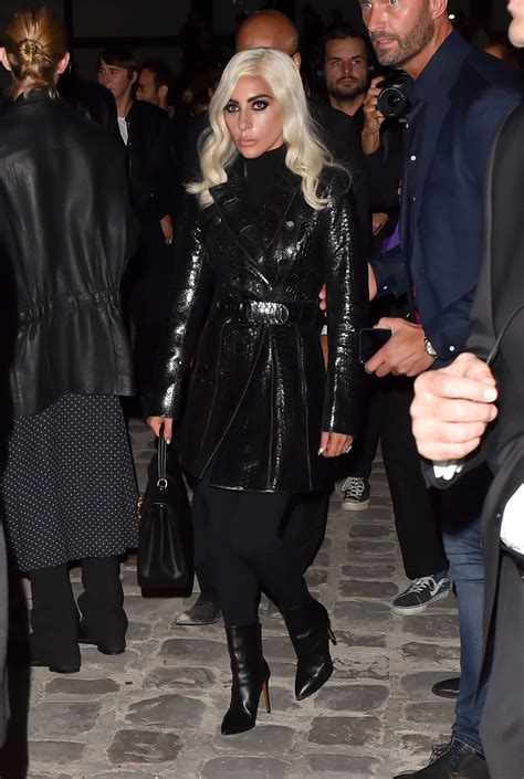 Lady Gaga Embraces Dark Glamour in Caped Celine Dress, .